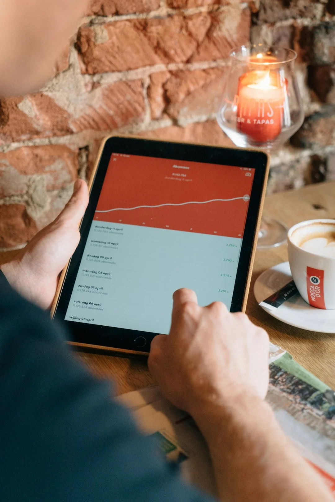 Person analyzing cryptocurrency data using a laptop, highlighting financial insights.